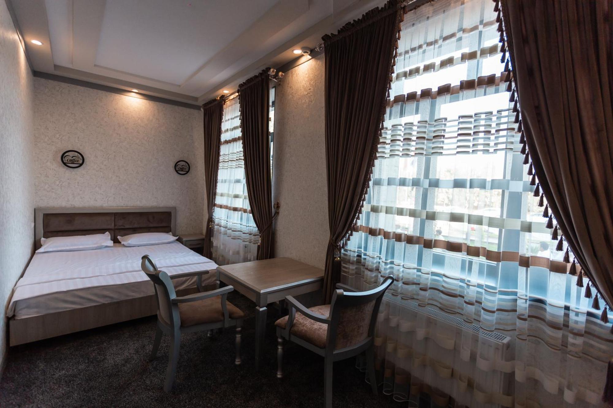 Diyor Hotel Marghilon Ngoại thất bức ảnh